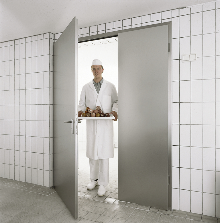 hygienic industrial steel door with factory worker
