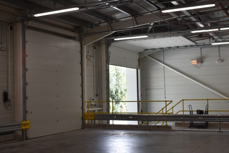 Back tracks of acoustic sectional doors