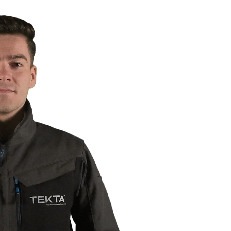 Presenter in Tekta branded coat standing in front of a clean white background. Black text stating,